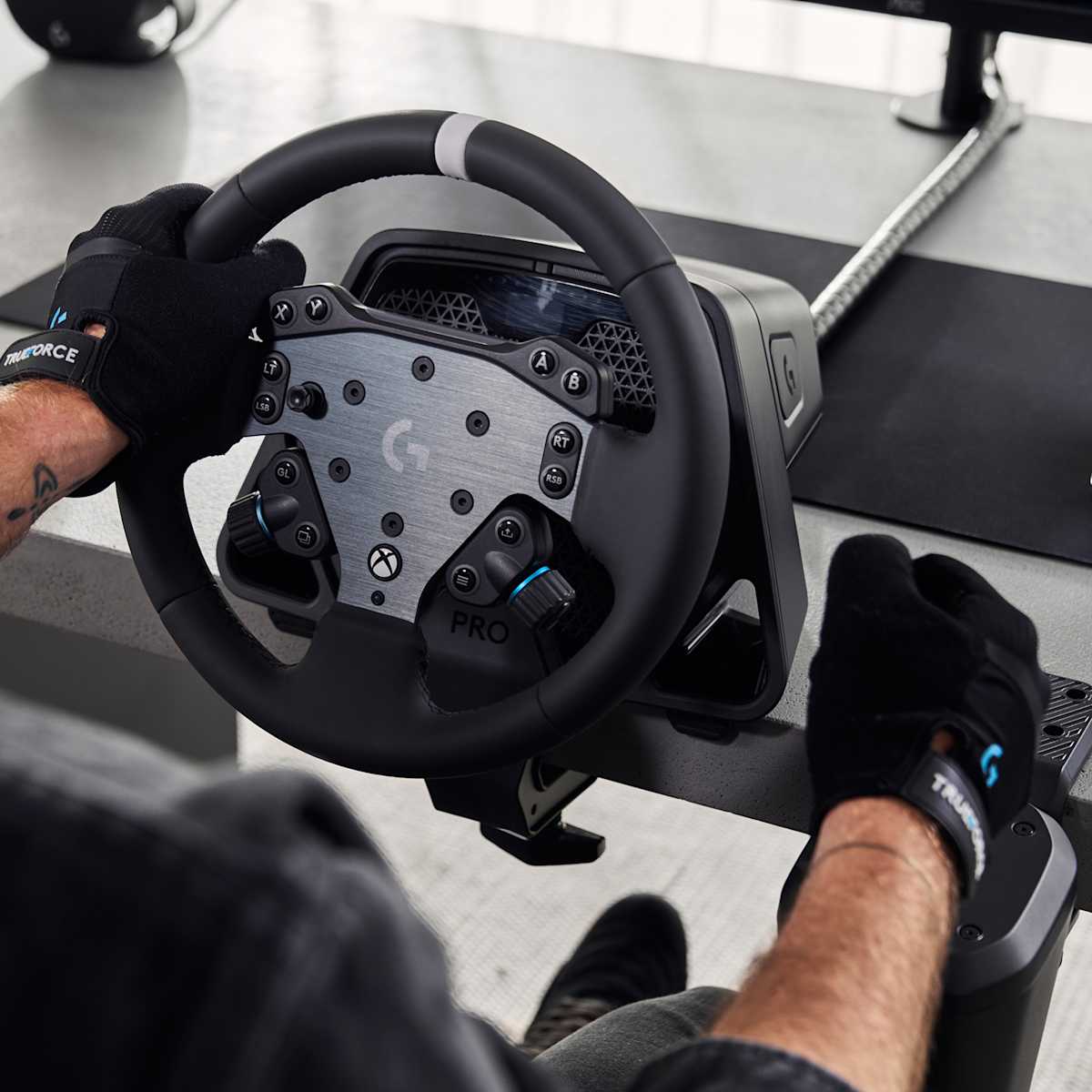 Logitech G Racing Gloves on a sim racing wheel