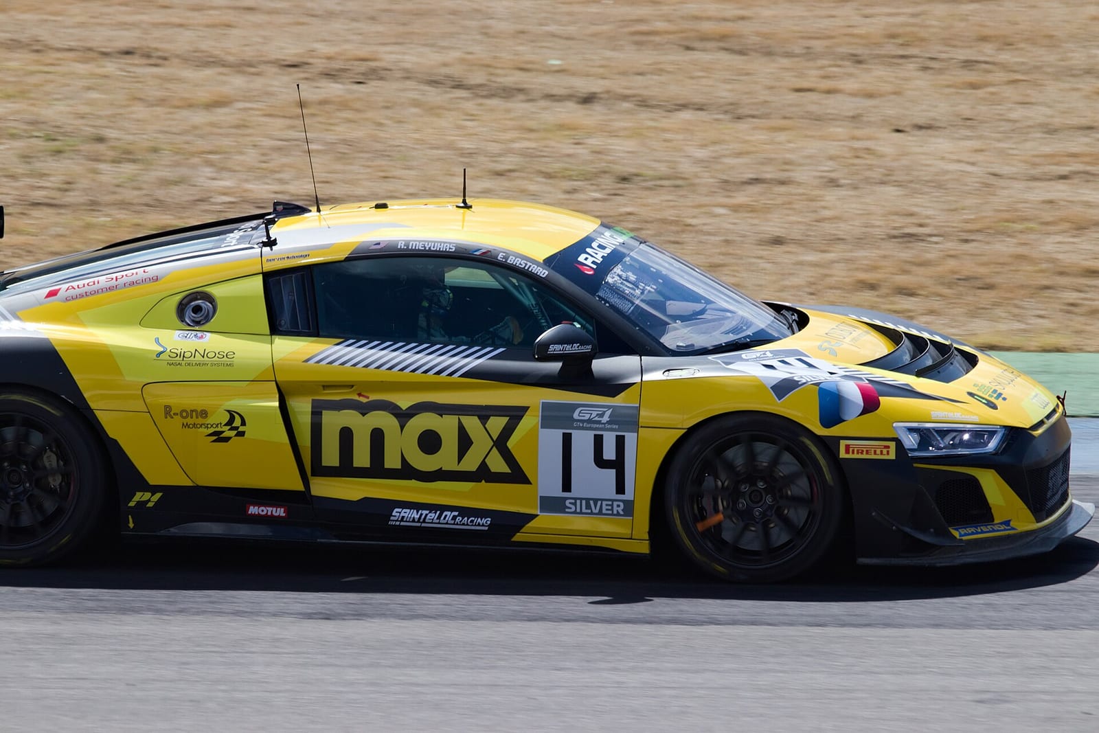 An Audi R8 LMS GT4 racing at Hockenheim