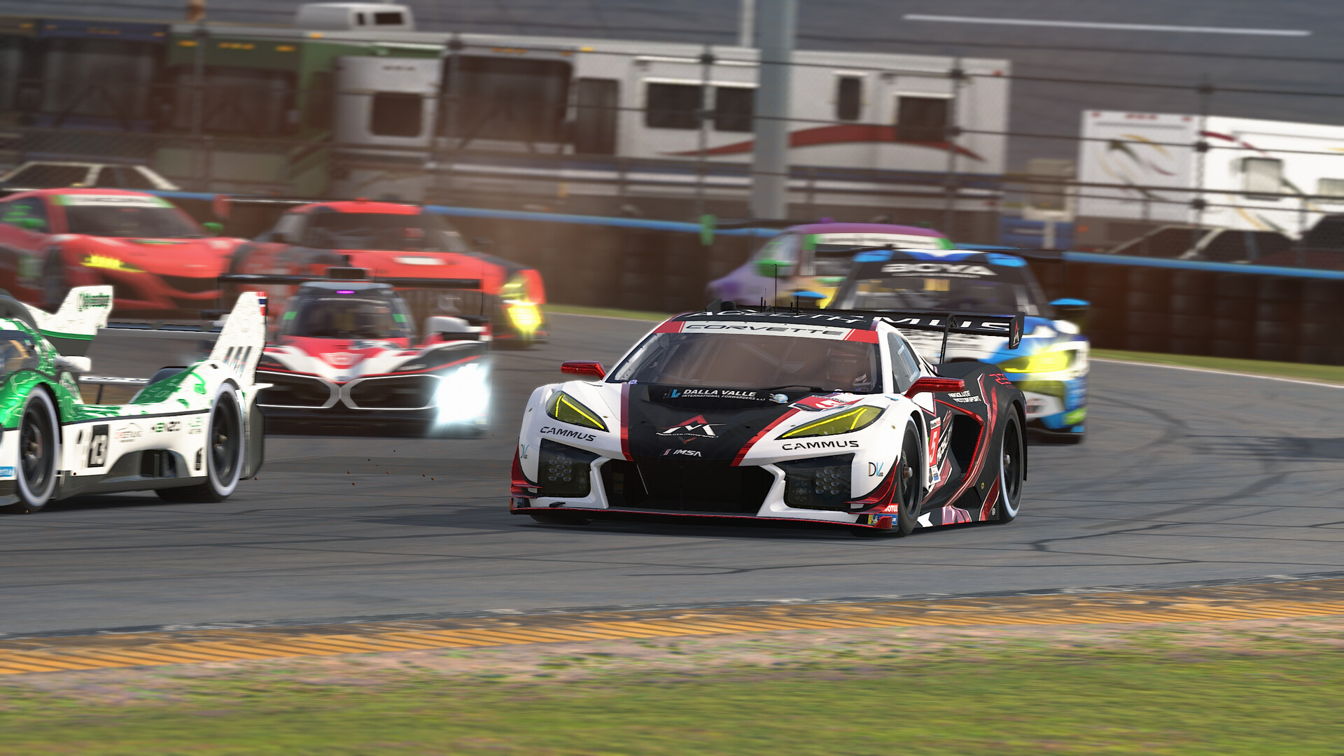 A white and black Corvette GT3 leads a multiclass pack of GT and prototype cars in iRacing, each car in a different livery
