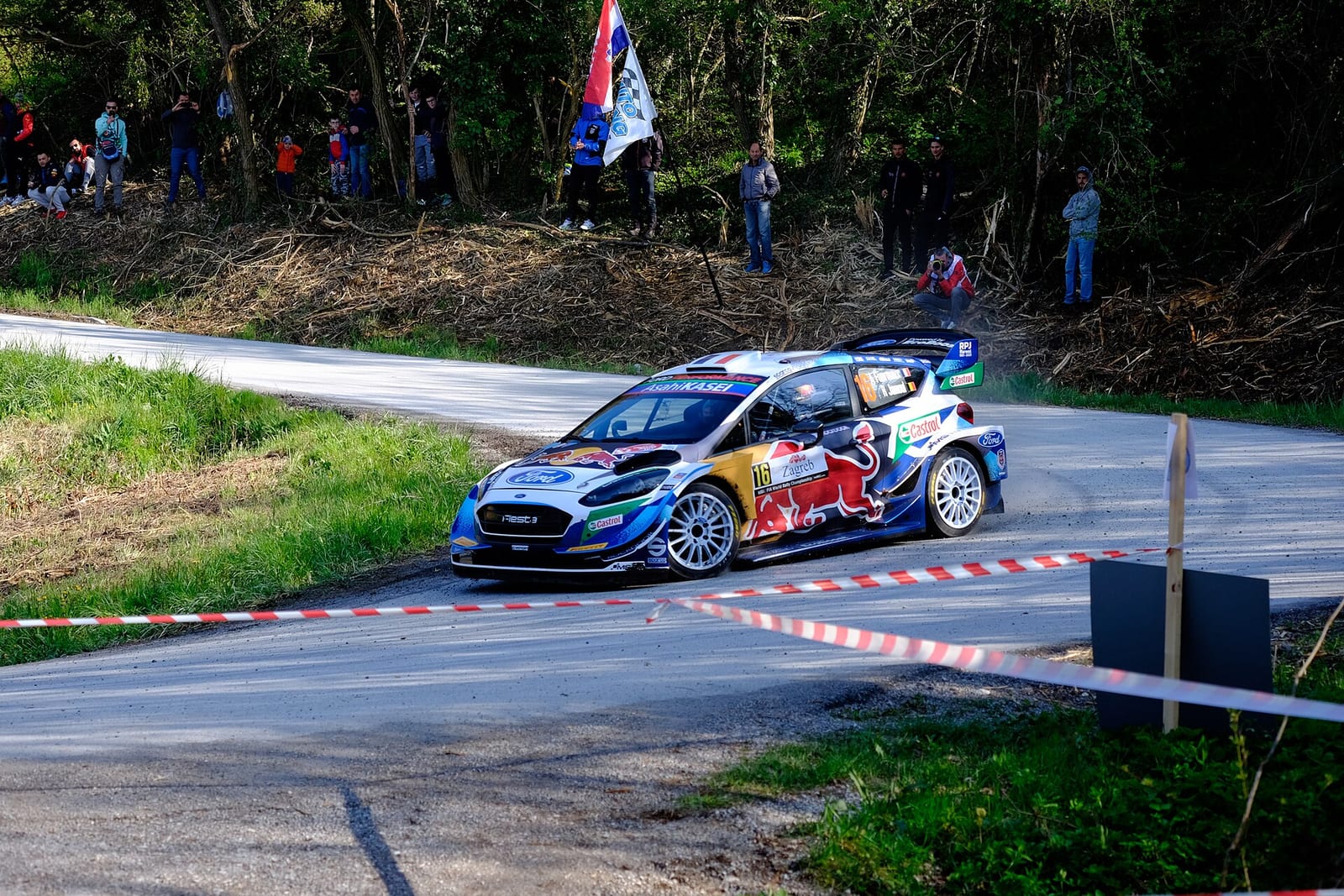 Ford Fiesta WRC in M-Sport Red Bull livery cornering on tarmac at Croatia Rally 2021