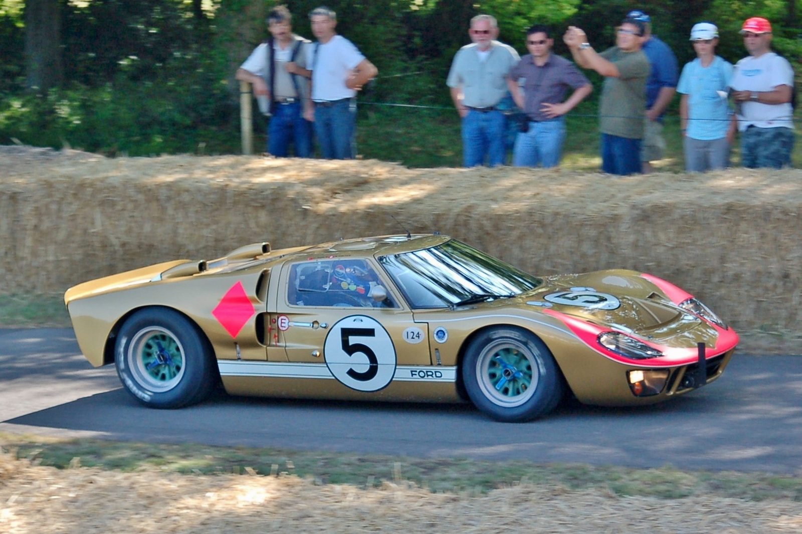 A gold Ford GT40 Mk II with the number 5 at the Goodwood hill climb