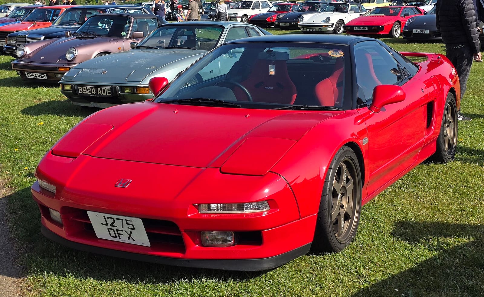 Red 1991 Honda NSX road car parked at a car show