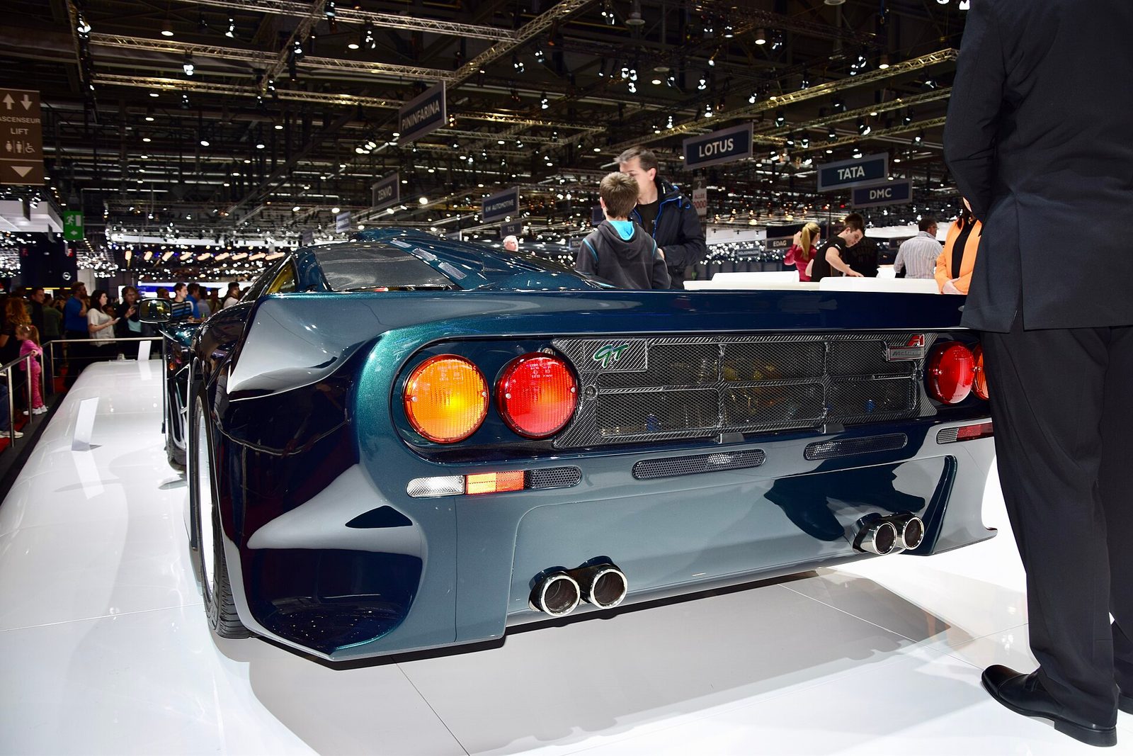 The rear of a dark green McLaren F1 GT on a stand at the Geneva Motor Show
