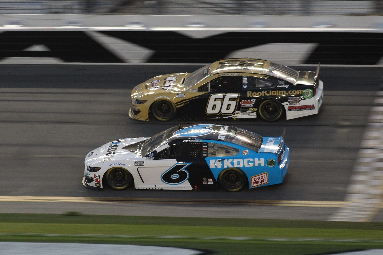 NASCAR Cup cars side by side on the Daytona banking in 2020