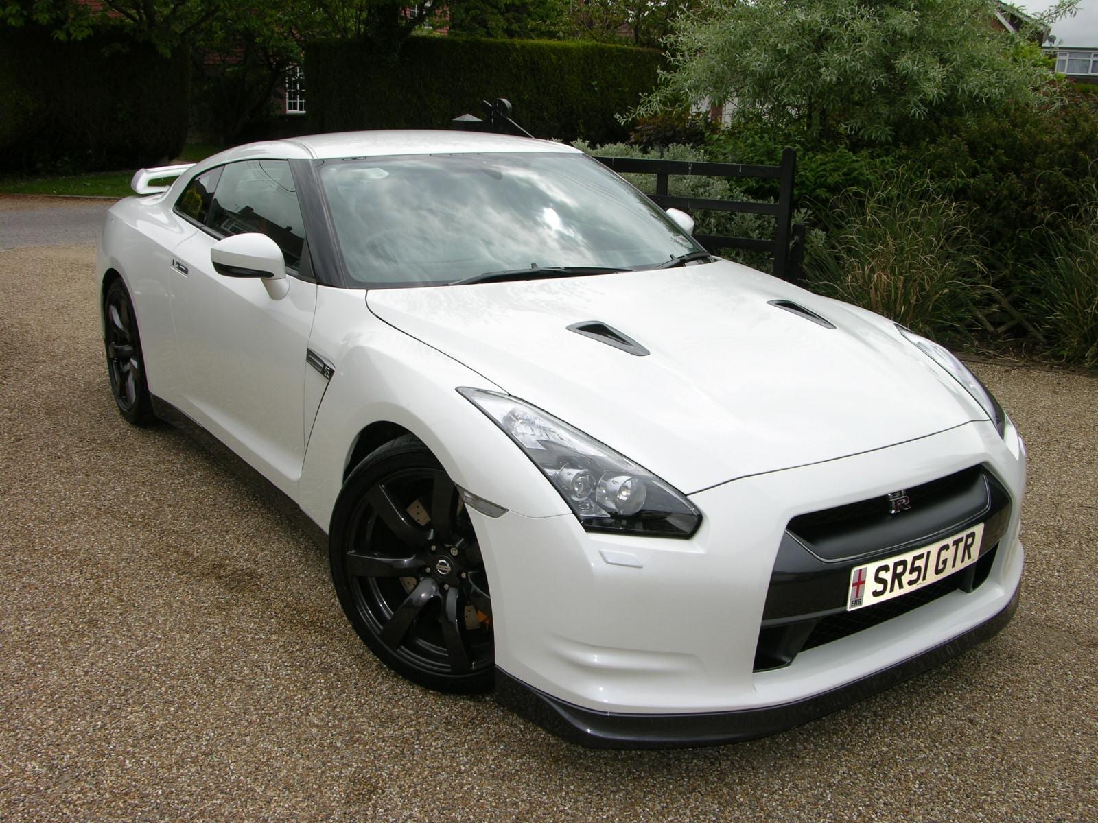 A white Nissan GT-R Black Edition (R35), front three quarter view