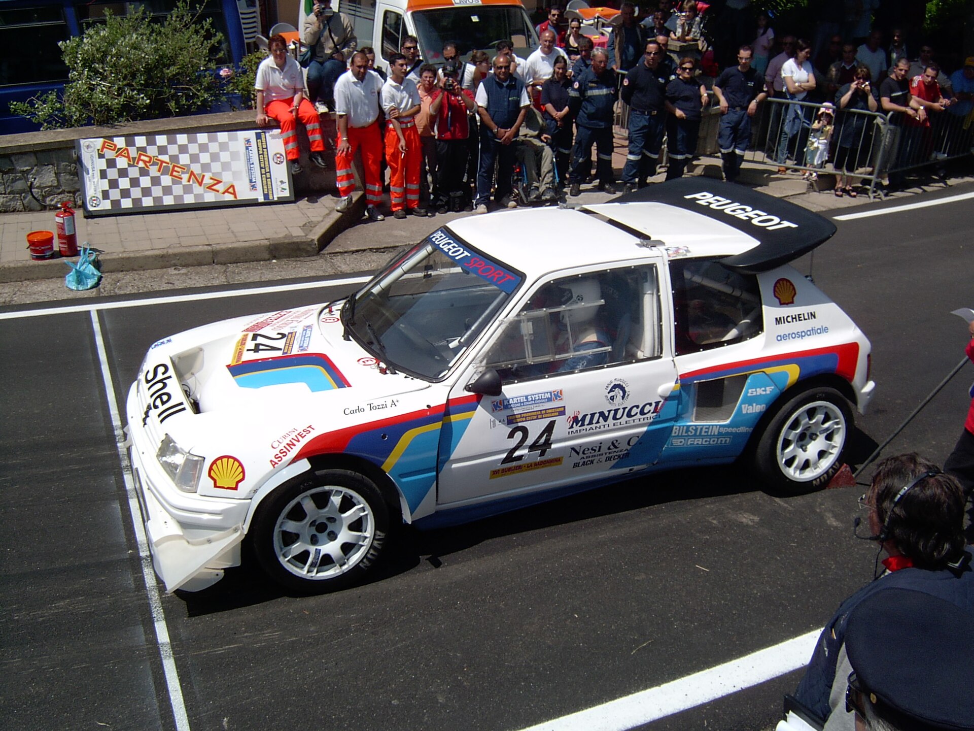 A Peugeot 205 Turbo 16 rally car at a hill climb start
