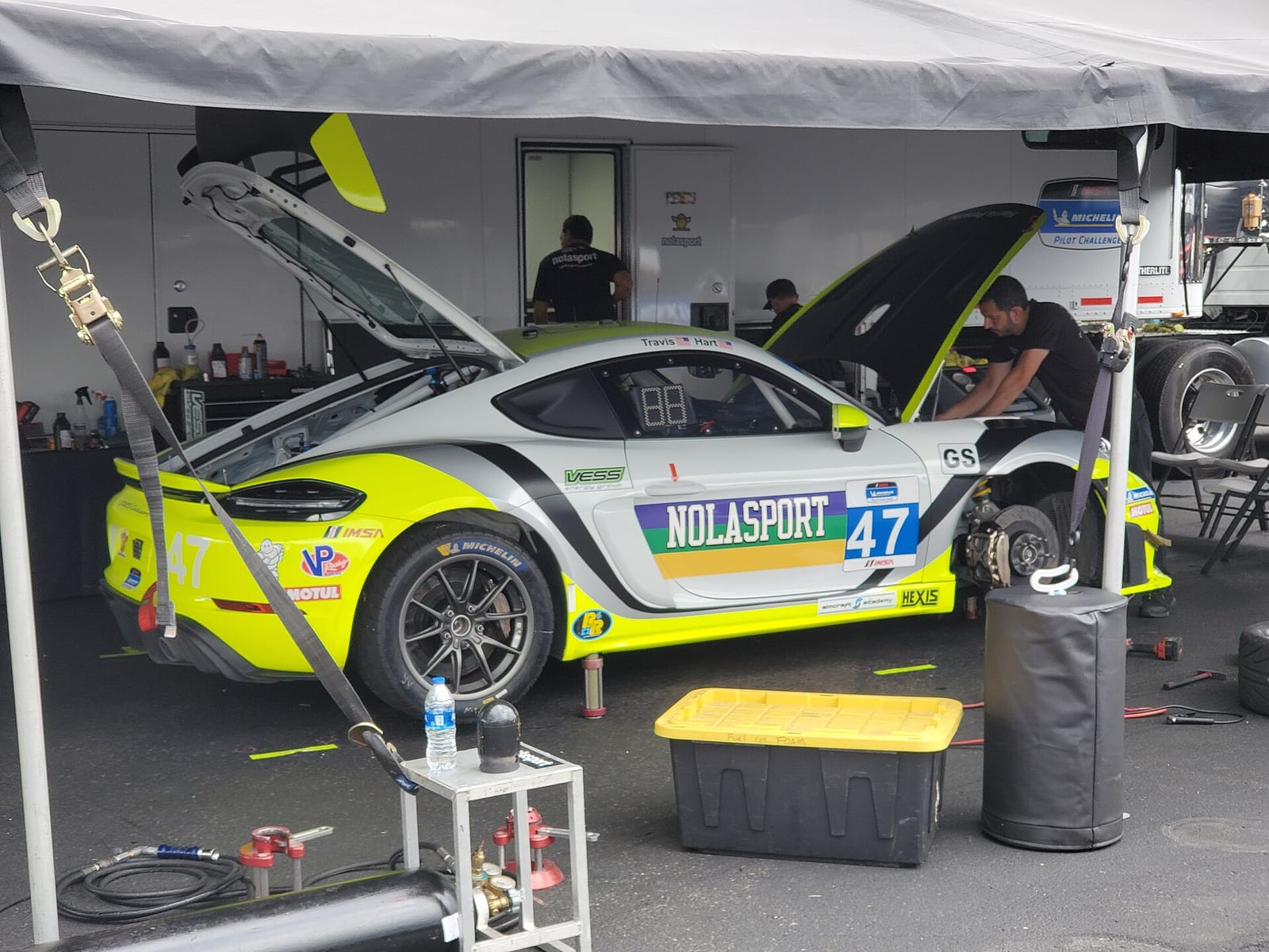 Porsche 718 Cayman GT4 Clubsport race car on track