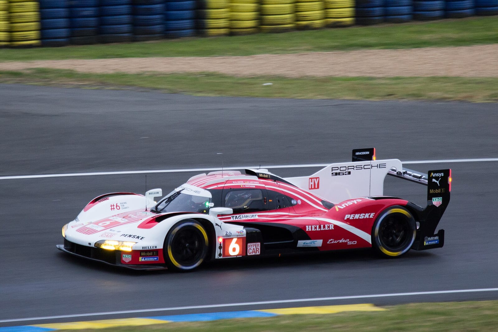 The number 6 Porsche Penske Motorsport 963 on track at Le Mans in 2024
