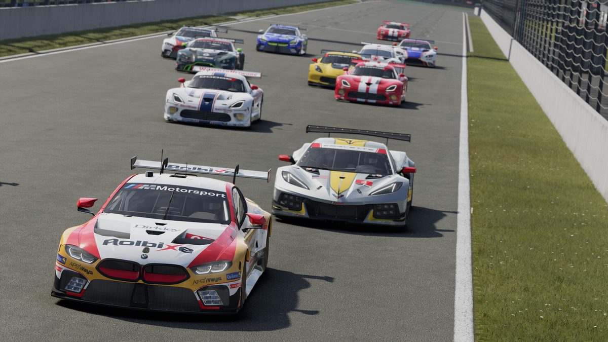 A BMW M8 GTE and a Chevrolet Corvette C8.R lead a GTE field down a straight in Project Motor Racing