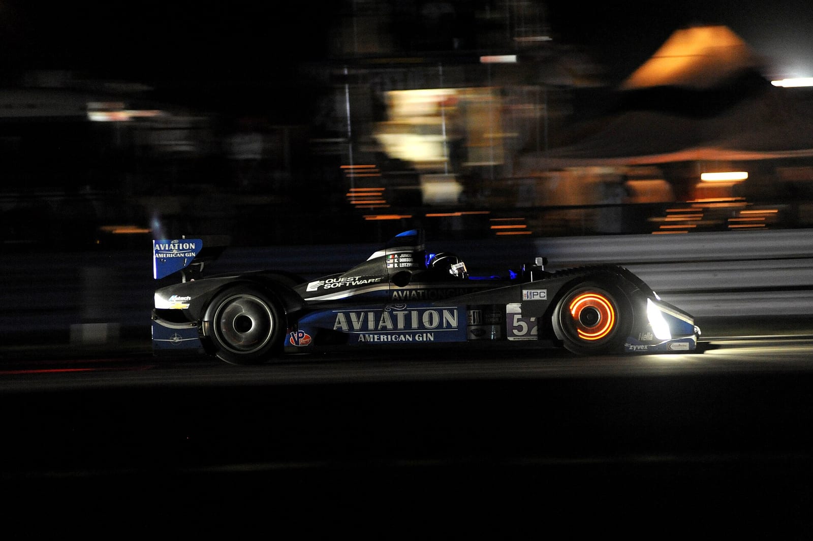 A prototype at Sebring at night with a front brake disc glowing orange