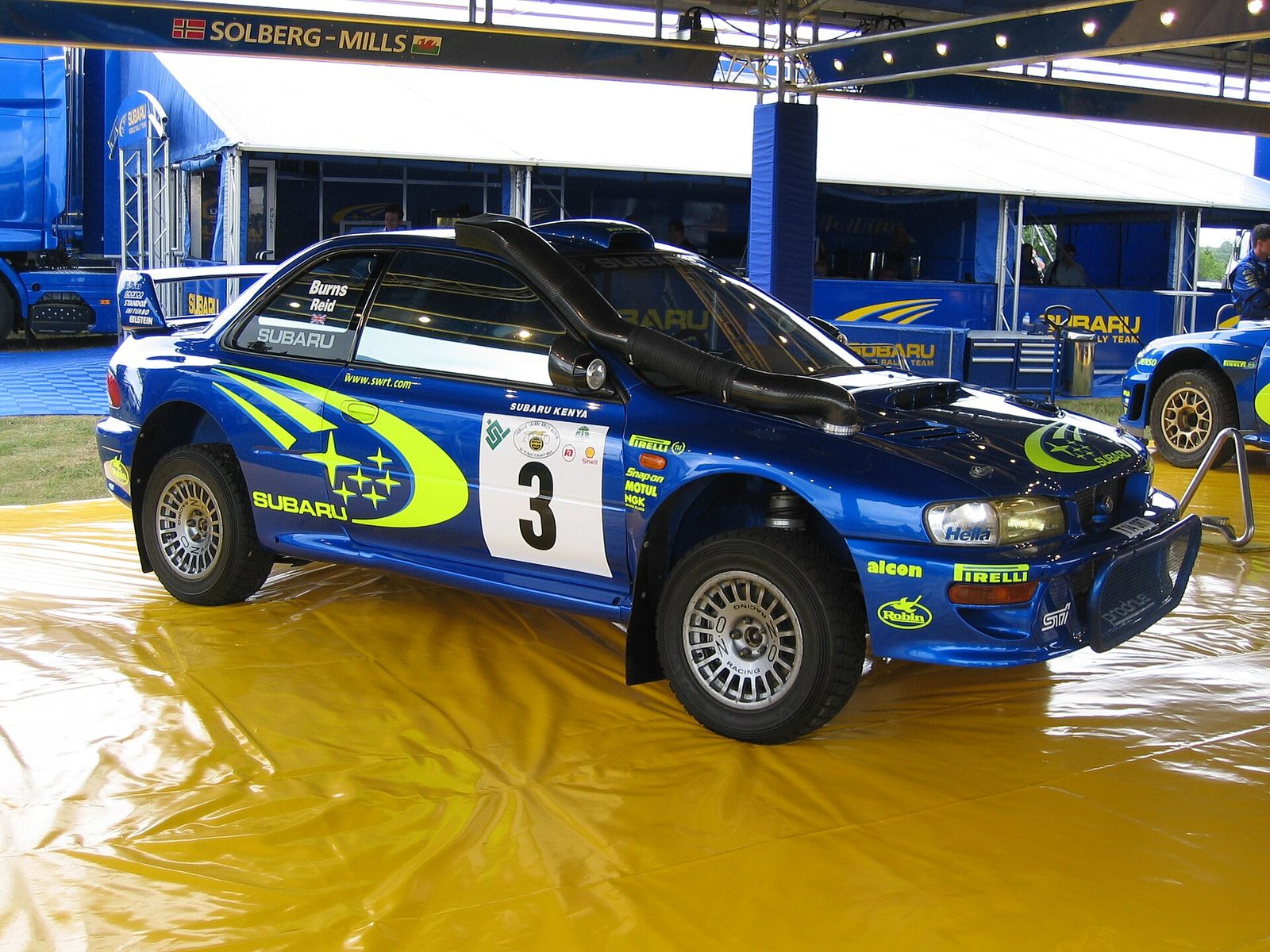 Richard Burns' blue Subaru Impreza WRC number 3 on display at the Goodwood Festival of Speed in 2006