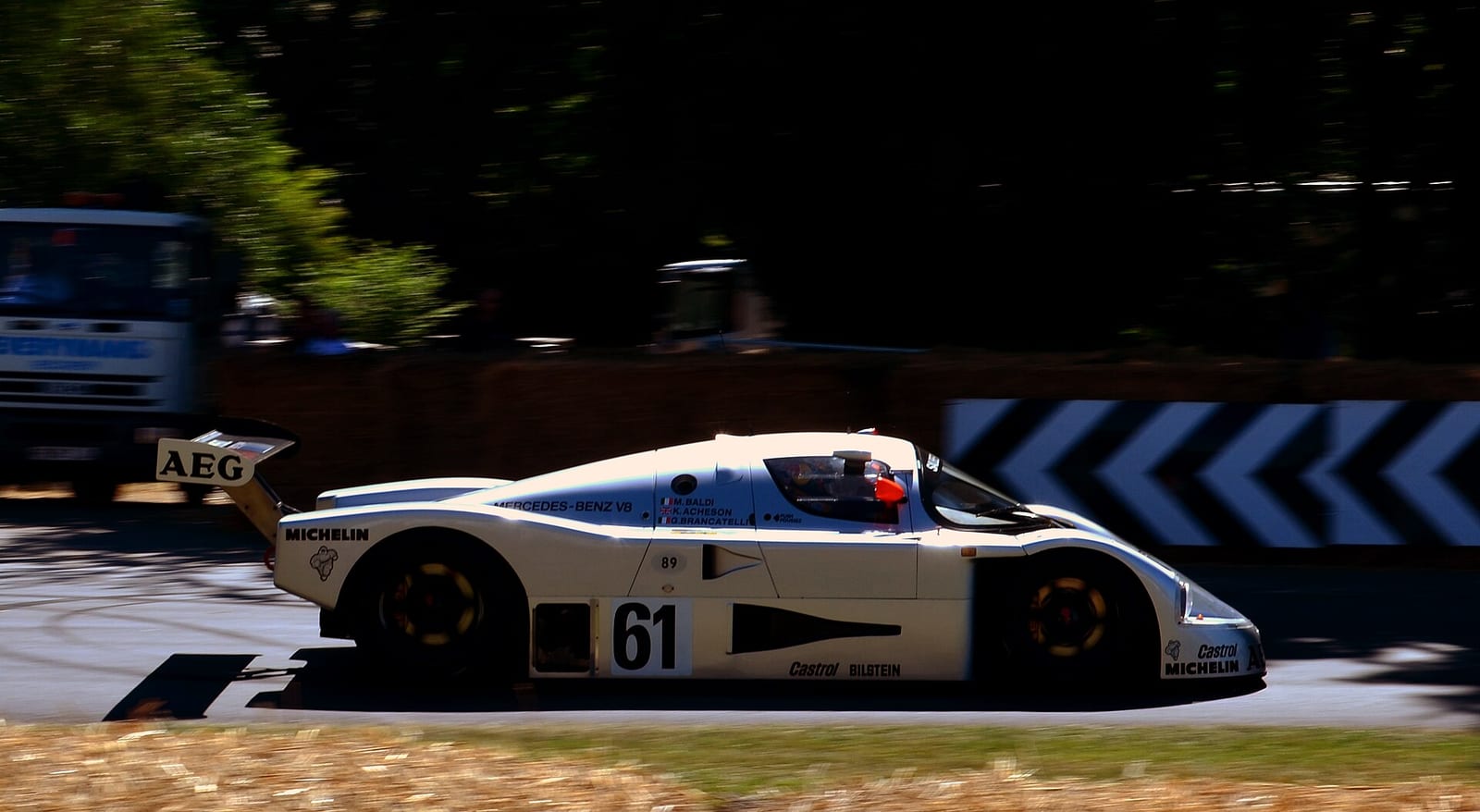 The silver number 61 Sauber Mercedes C9 at the Goodwood Festival of Speed in 2014