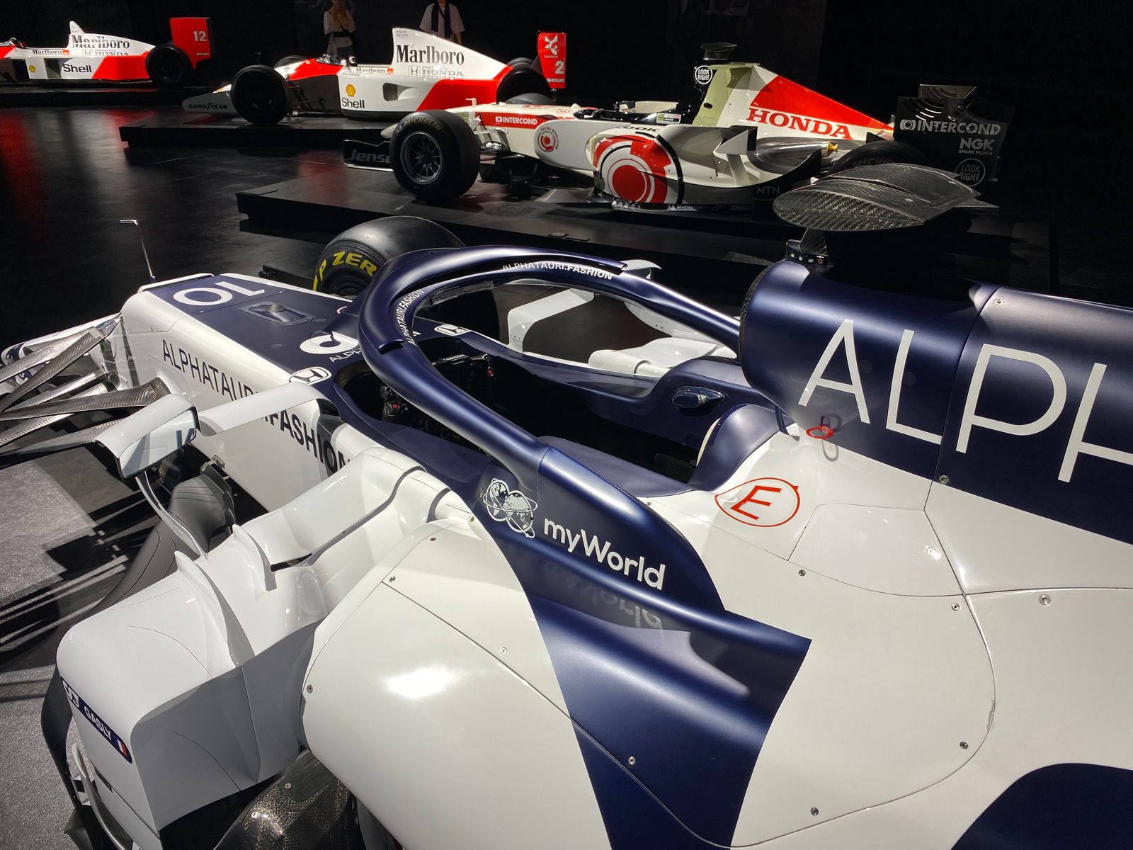 The cockpit of a 2020 AlphaTauri AT01 Formula 1 car under the halo, on display