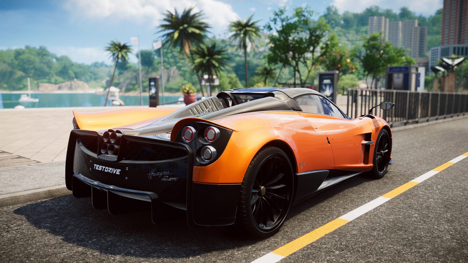An orange Pagani Huayra Roadster parked on a seafront road on Hong Kong Island in Test Drive Unlimited Solar Crown