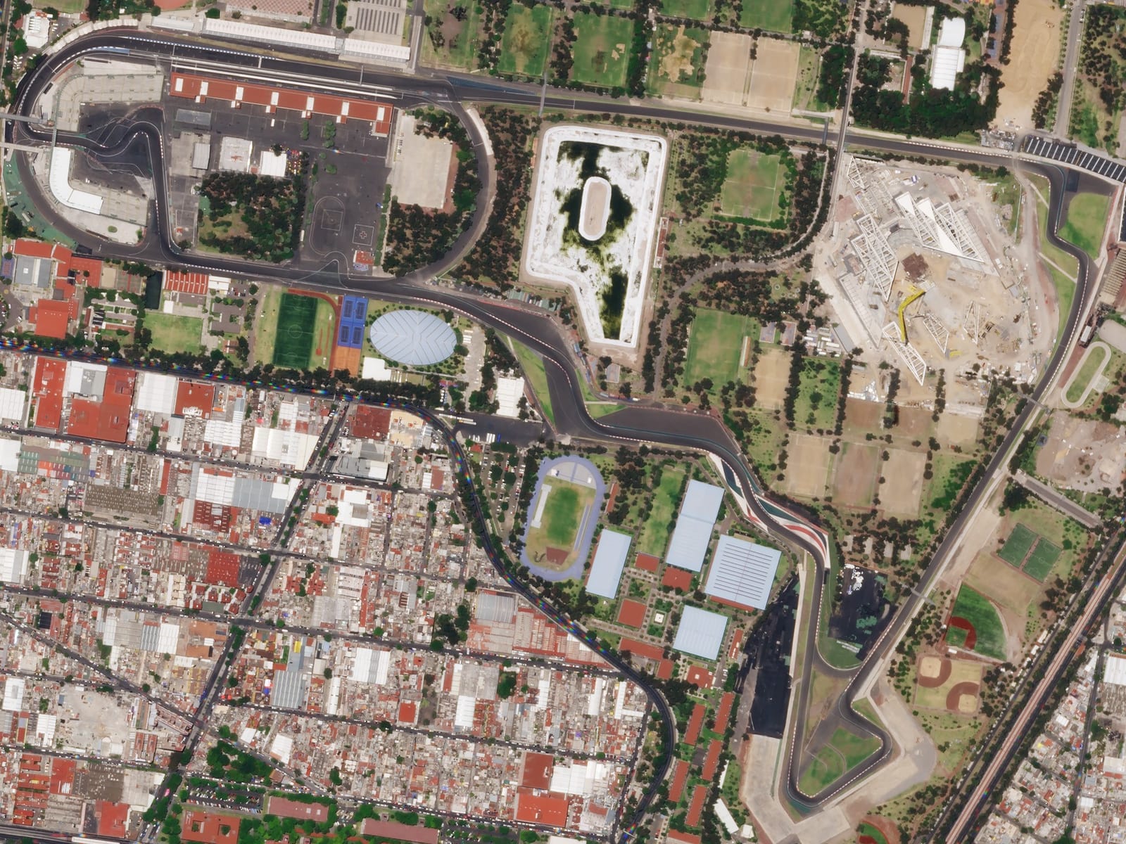 Satellite view of the Autodromo Hermanos Rodriguez in Mexico City with the long main straight and the stadium section