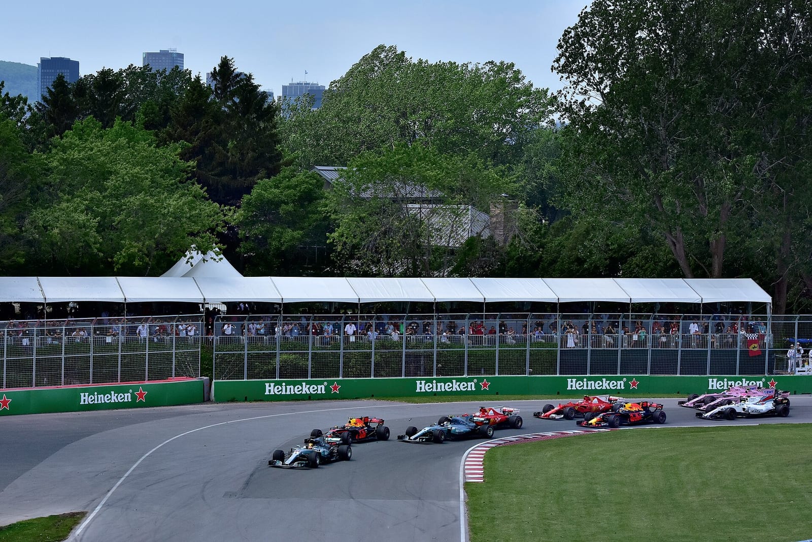 Lewis Hamilton leads the field in the Mercedes through the first corners of the 2017 Canadian Grand Prix
