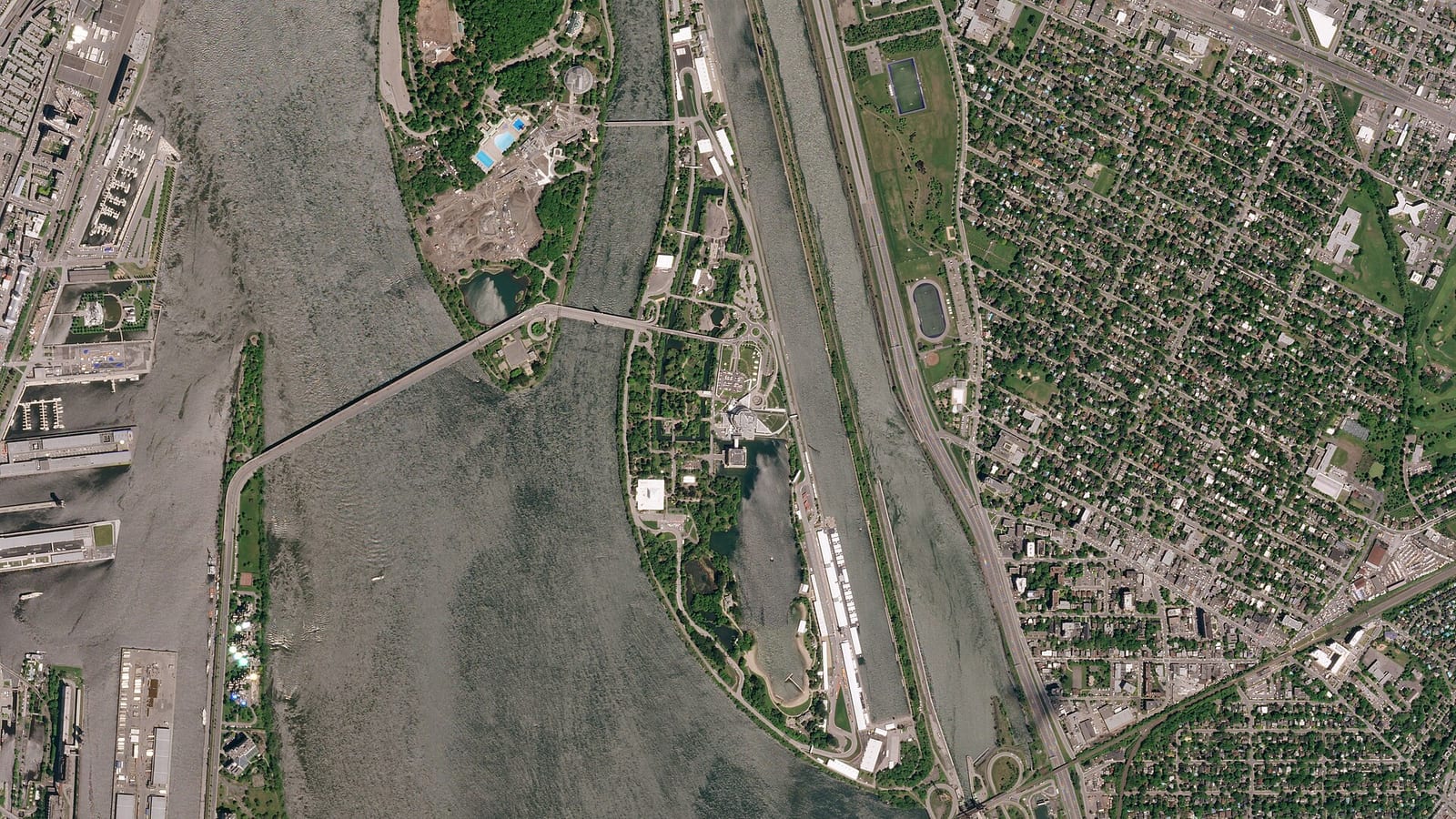 Satellite view of the Circuit Gilles Villeneuve on Notre Dame island in Montreal, with the rowing basin next to the pit straight