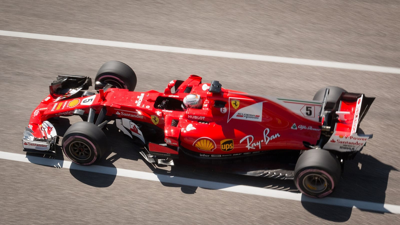 Sebastian Vettel's red Ferrari SF70H, number 5, seen from above and behind in Austin during the 2017 United States Grand Prix weekend