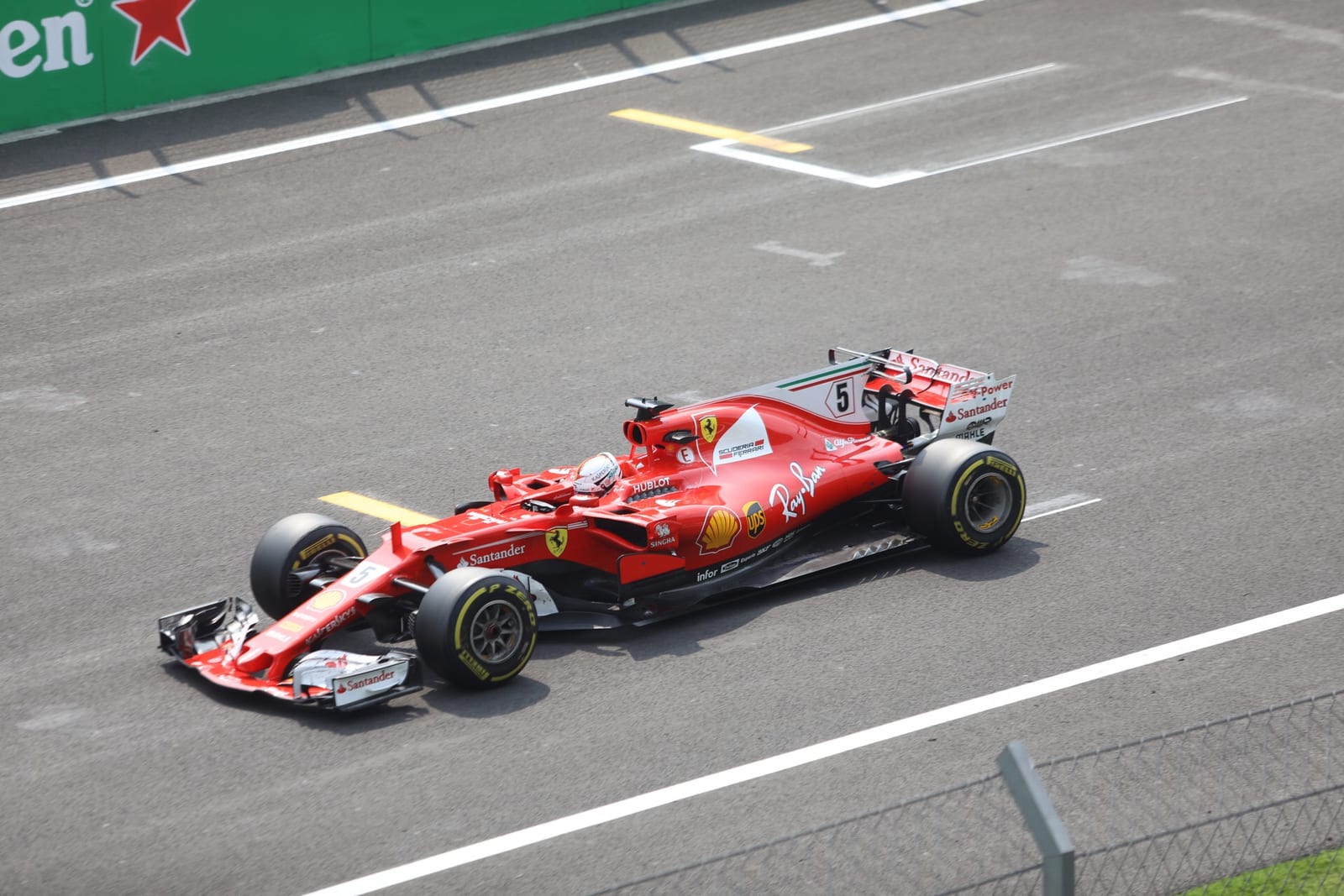 Sebastian Vettel in the Ferrari SF70H on the main straight at the 2017 Mexican Grand Prix