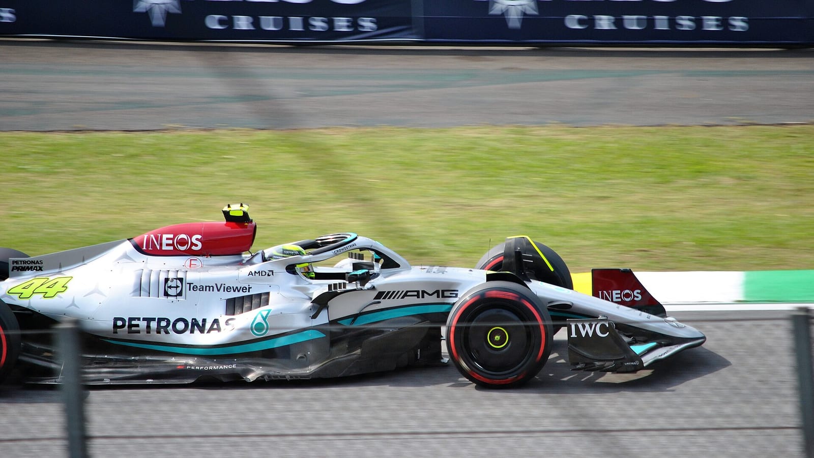 Lewis Hamilton's silver Mercedes W13, number 44, seen from the side at speed at Interlagos during the 2022 São Paulo Grand Prix weekend