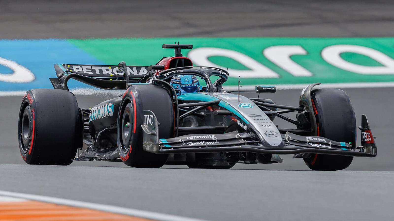 A Mercedes W15 on soft tyres seen from low down at the front, at Zandvoort during the 2024 Dutch Grand Prix weekend