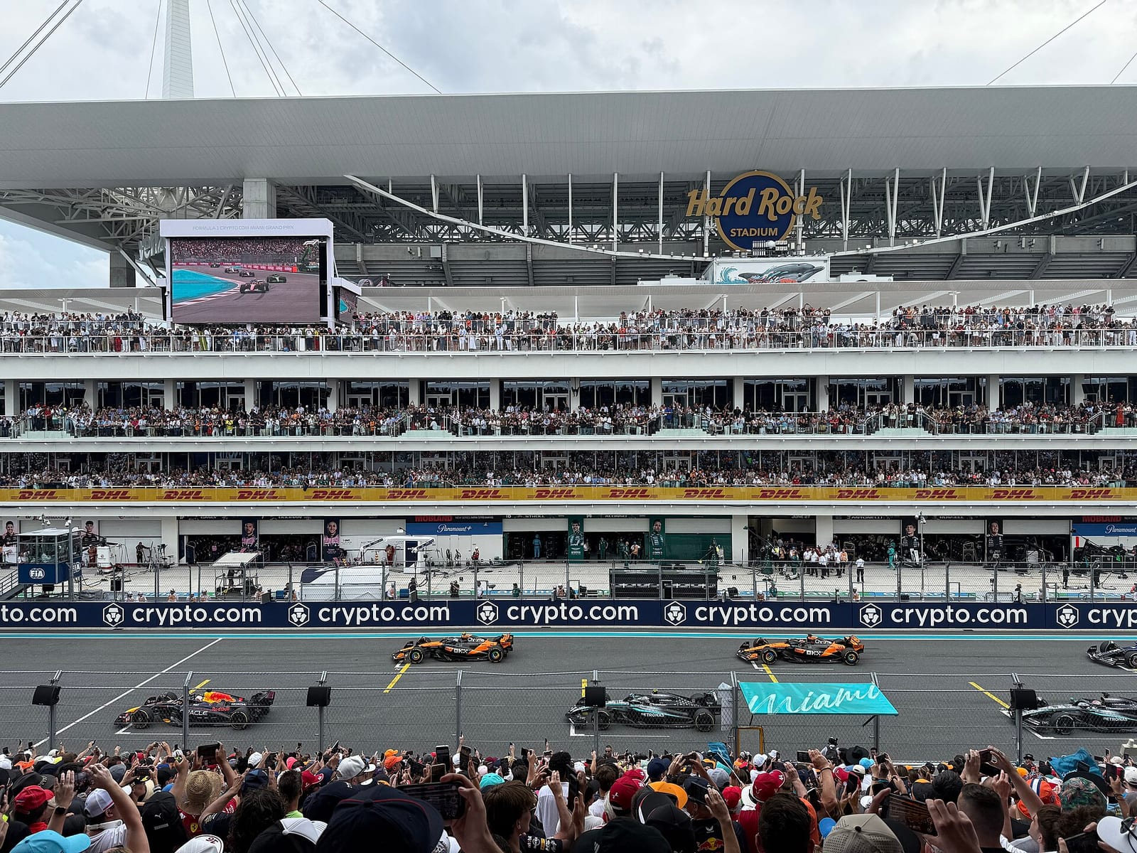 The first three rows of the grid in front of Hard Rock Stadium before the start of the 2025 Miami Grand Prix