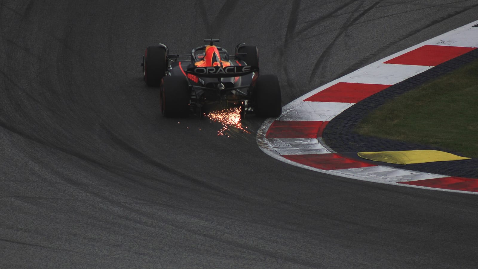 Max Verstappen in the Red Bull RB19 with sparks under the car at the Red Bull Ring in 2023
