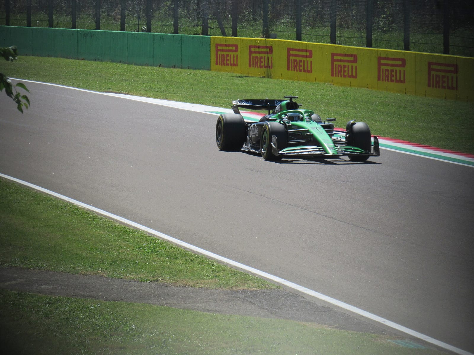 A green and black Sauber C45 on track at Imola during the 2025 Emilia Romagna Grand Prix weekend