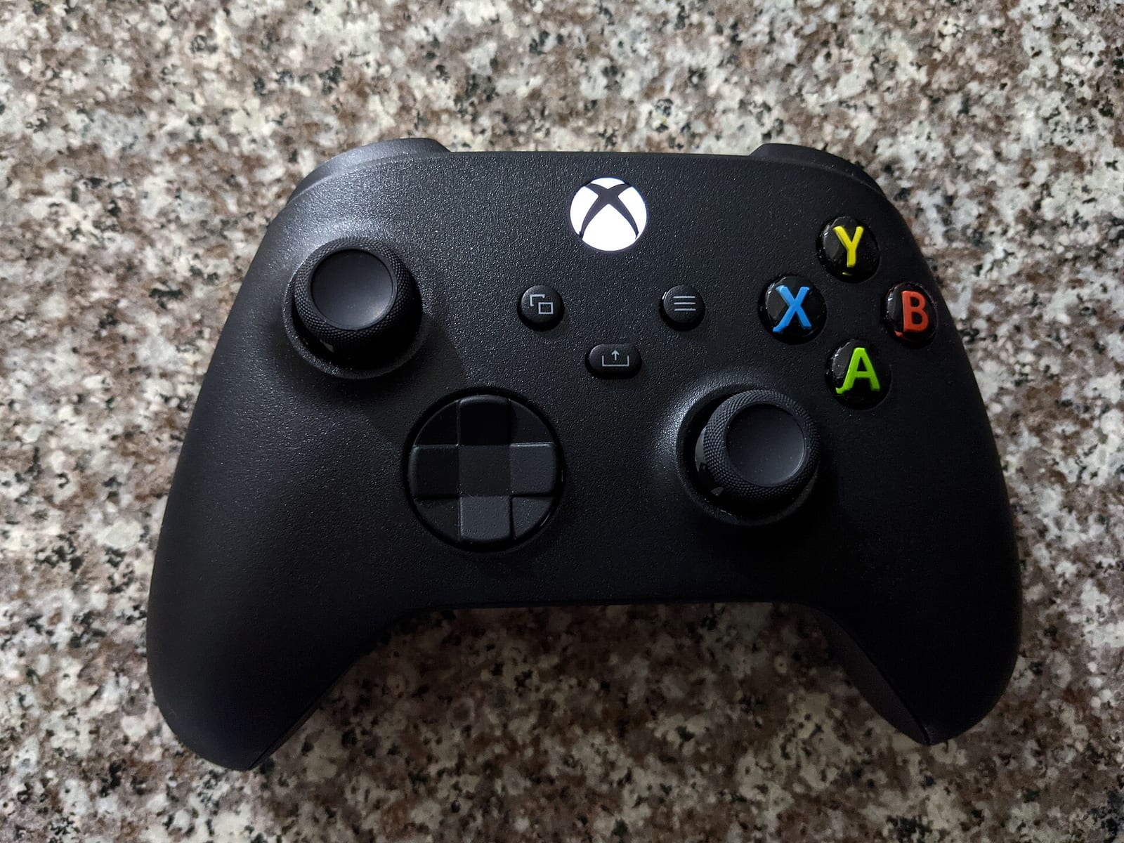 A black Xbox Series wireless controller seen from above